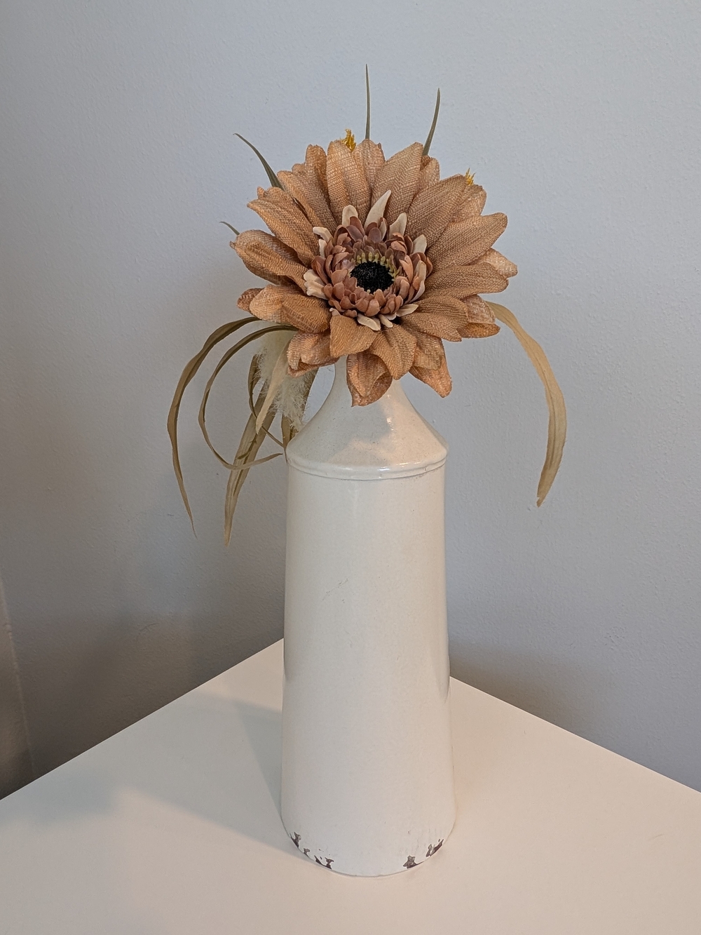 Distressed White Metal Vase with Artificial Floral Arrangement